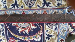 Leathering on edge of Persian Top quality rug